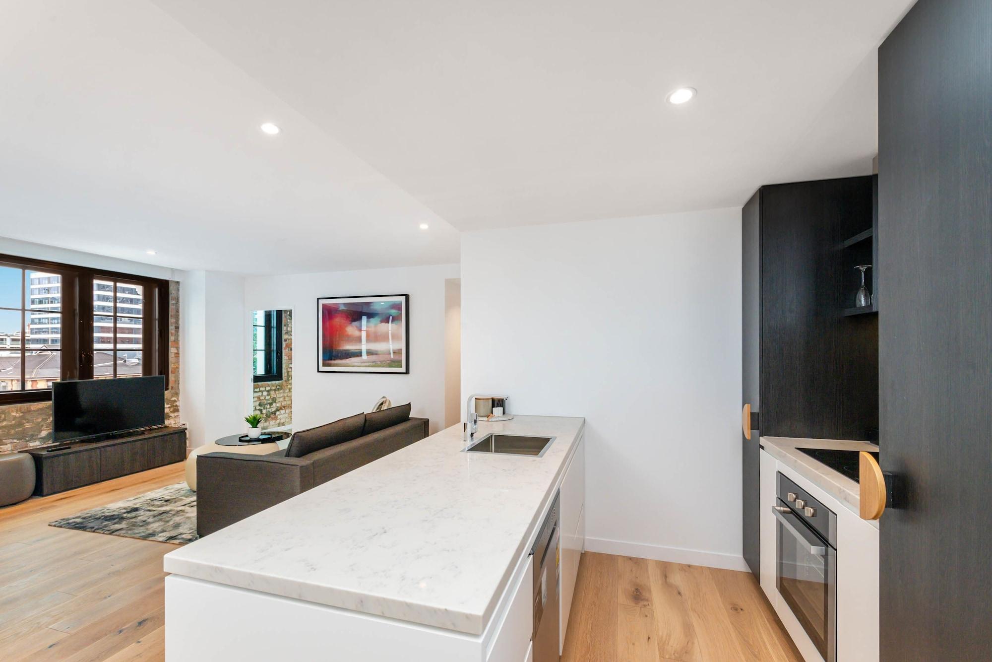 Fv By Peppers Aparthotel Brisbane Bagian luar foto The kitchen and living area of a typical apartment