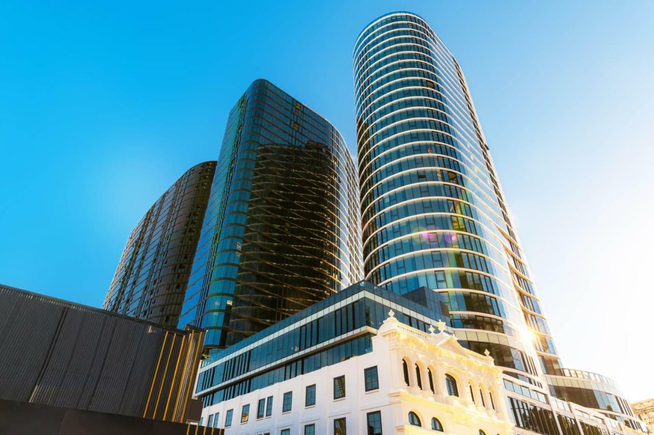 Fv By Peppers Aparthotel Brisbane Bagian luar foto The complex at sunset